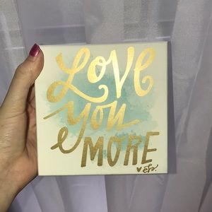 “Love you more” decor piece
